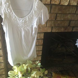 White short sleeved blouse.